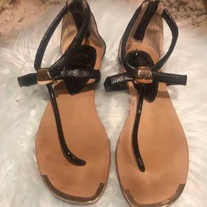 Isola black and gold sandals